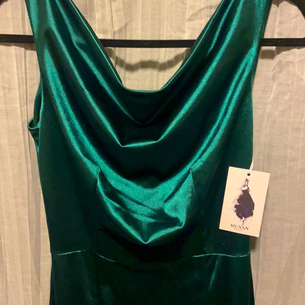 Elegant satin/body con material formal dress.